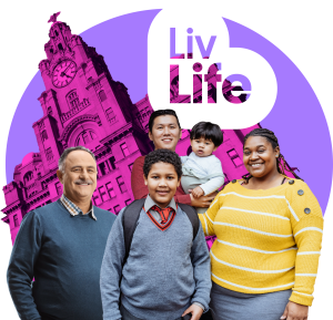 People in front of Liver building with Live Life Liverpool logo
